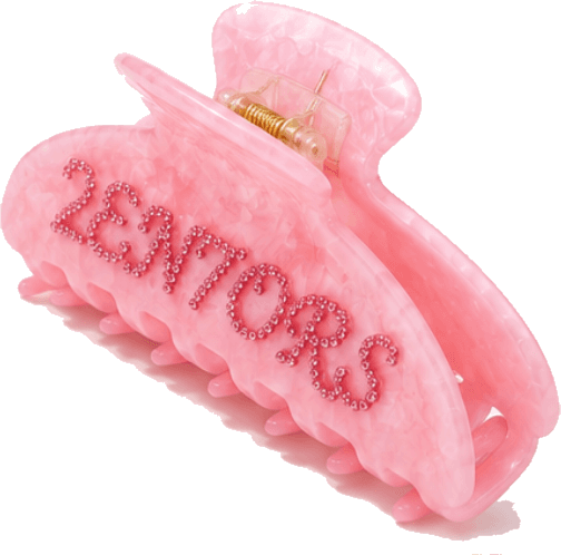 The 2EN7ORS claw clip in rose quartz marble, beaded lettering across the face.