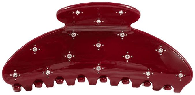 The Bordeaux claw clip in deep wine red, scattered with clear stones, straight on from the front.