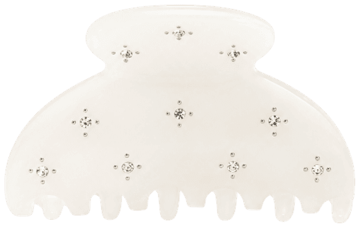 The Champagne Mini claw clip in marbled ivory, scattered with clear stones, straight on from the front.