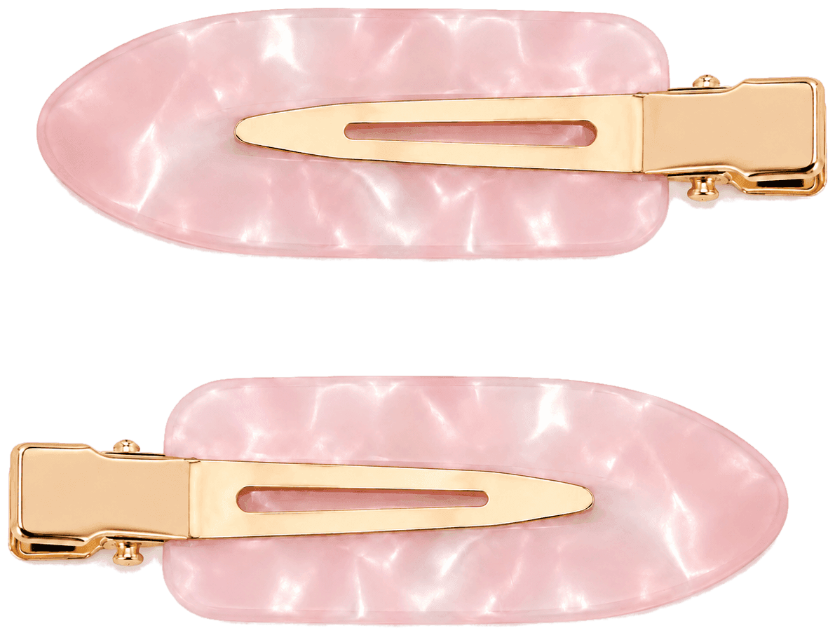 A pair of pink marbled Marble pintail clips with gold hardware.